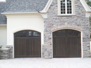 Two Dark Custom Wood Doors - With Arch