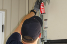 Garaga installer doing maintenance