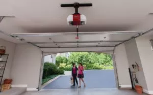 Children in front of an opened garage door