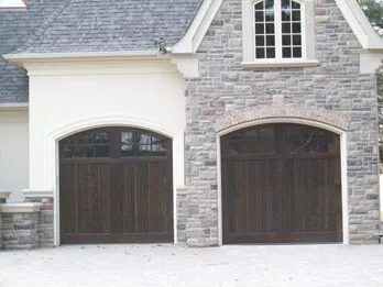 Two Dark Custom Wood Doors - With Arch